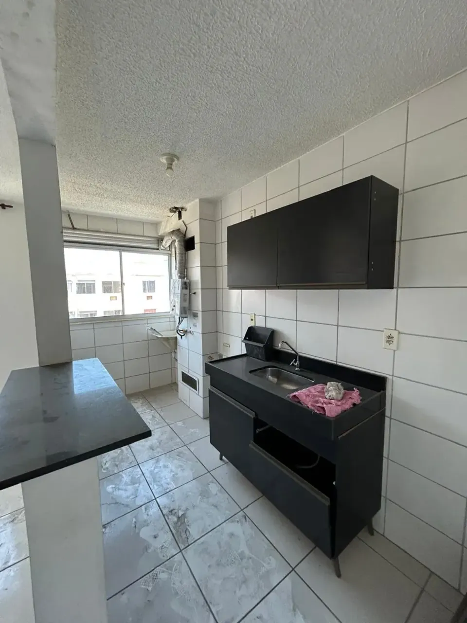 Apartamento de 2 quartos e 2 banheiros com cozinha americana