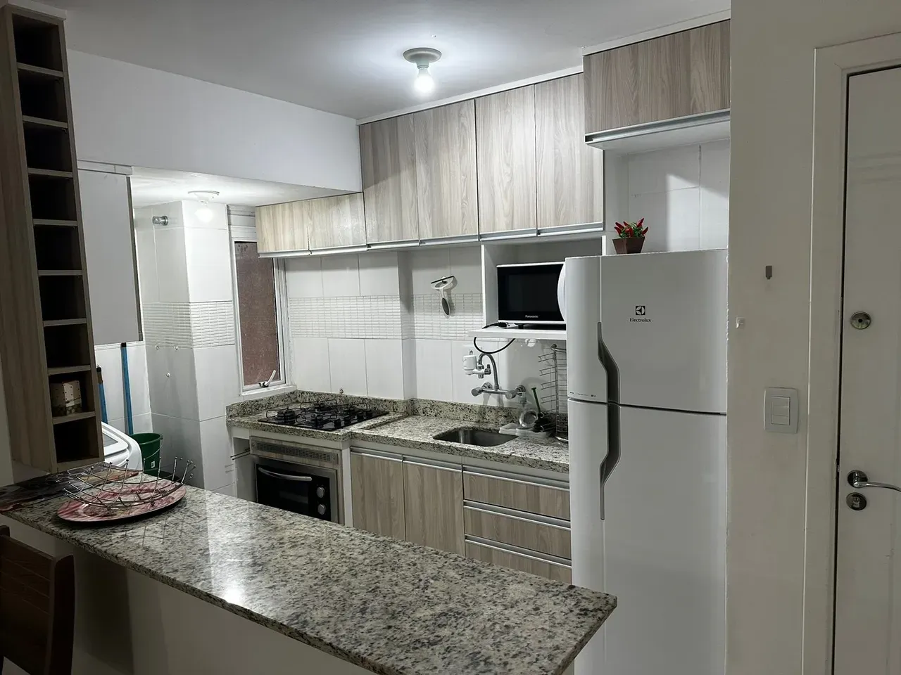 Balcony with a grill in a 2-bedroom apartment, 50 m² — photo 6