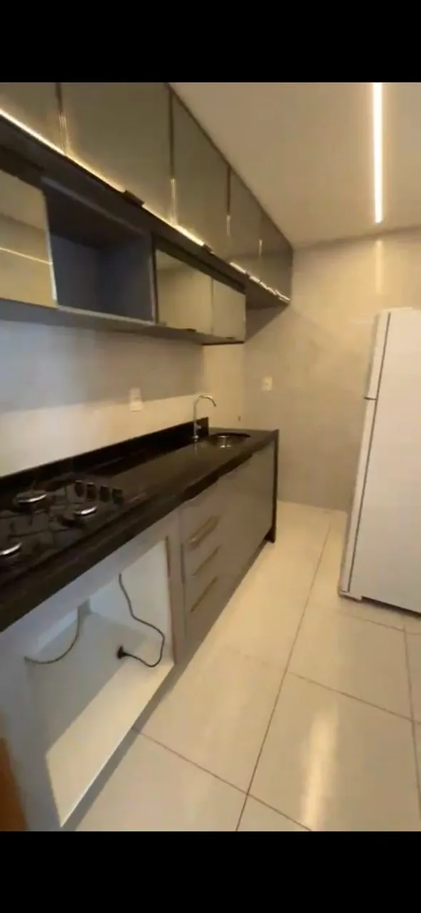 Furnished apartment with an open-plan kitchen and gas stove — photo 2