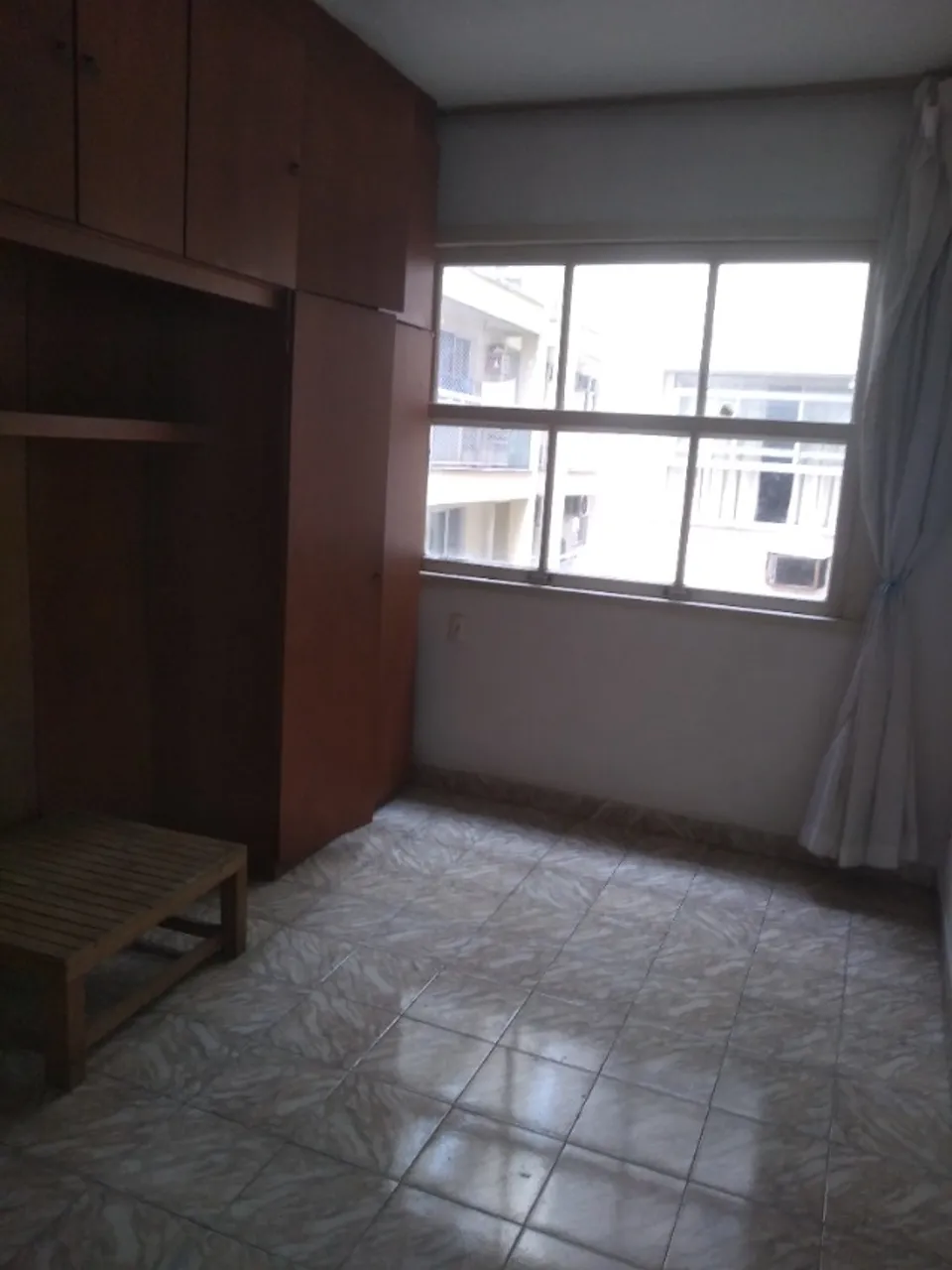 1-bedroom 1-bath apartment with a laundry area — photo 3