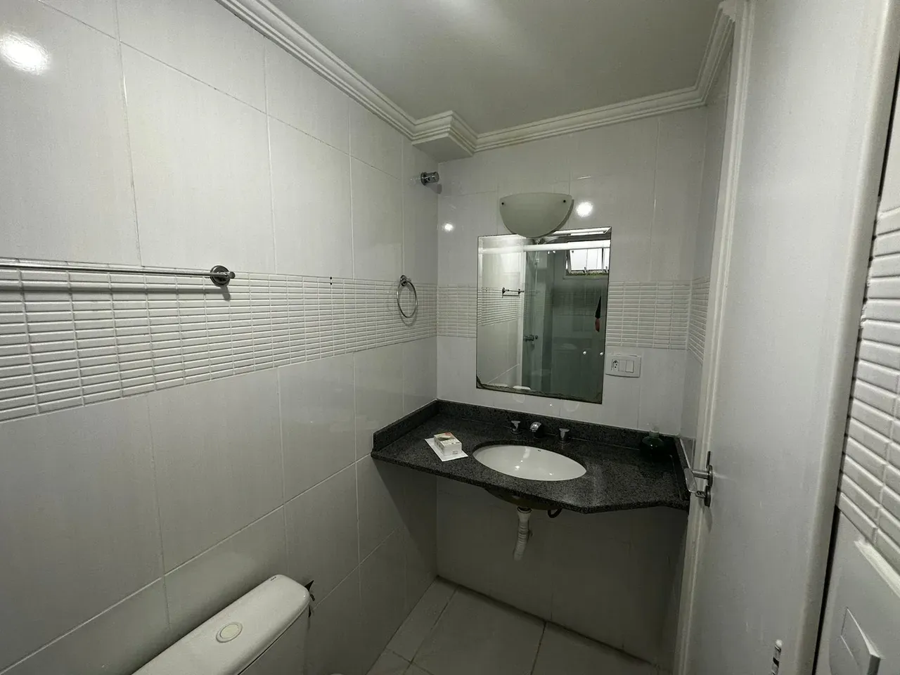 Balcony with a grill in a 2-bedroom apartment, 50 m² — photo 13