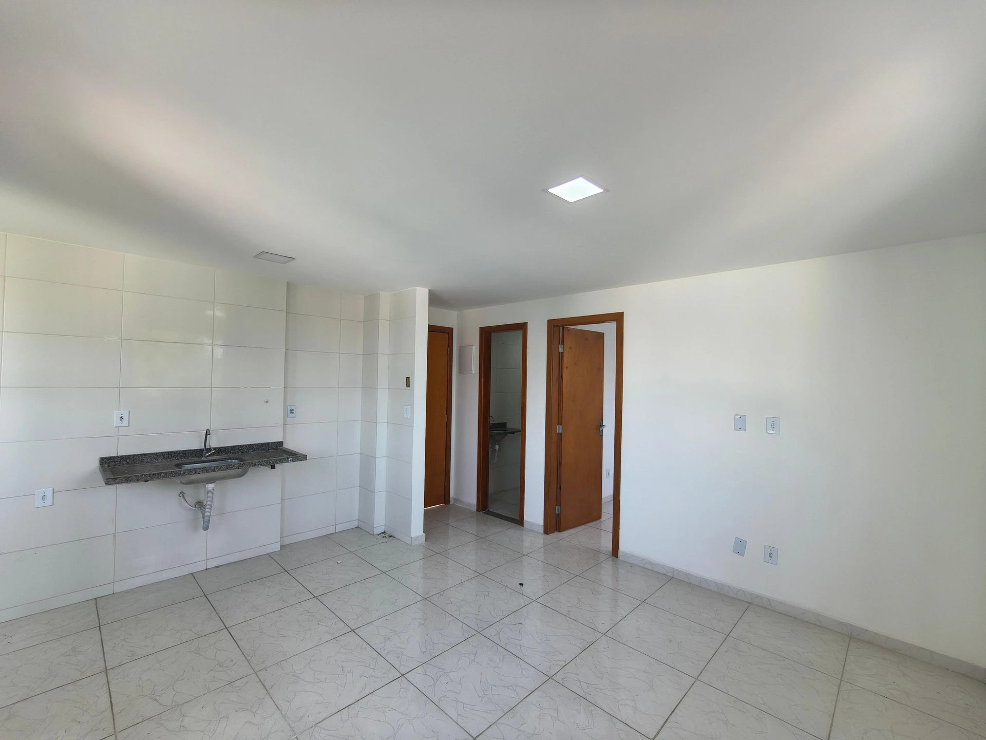 Apartamento sem mobília com 1 quarto e vaga