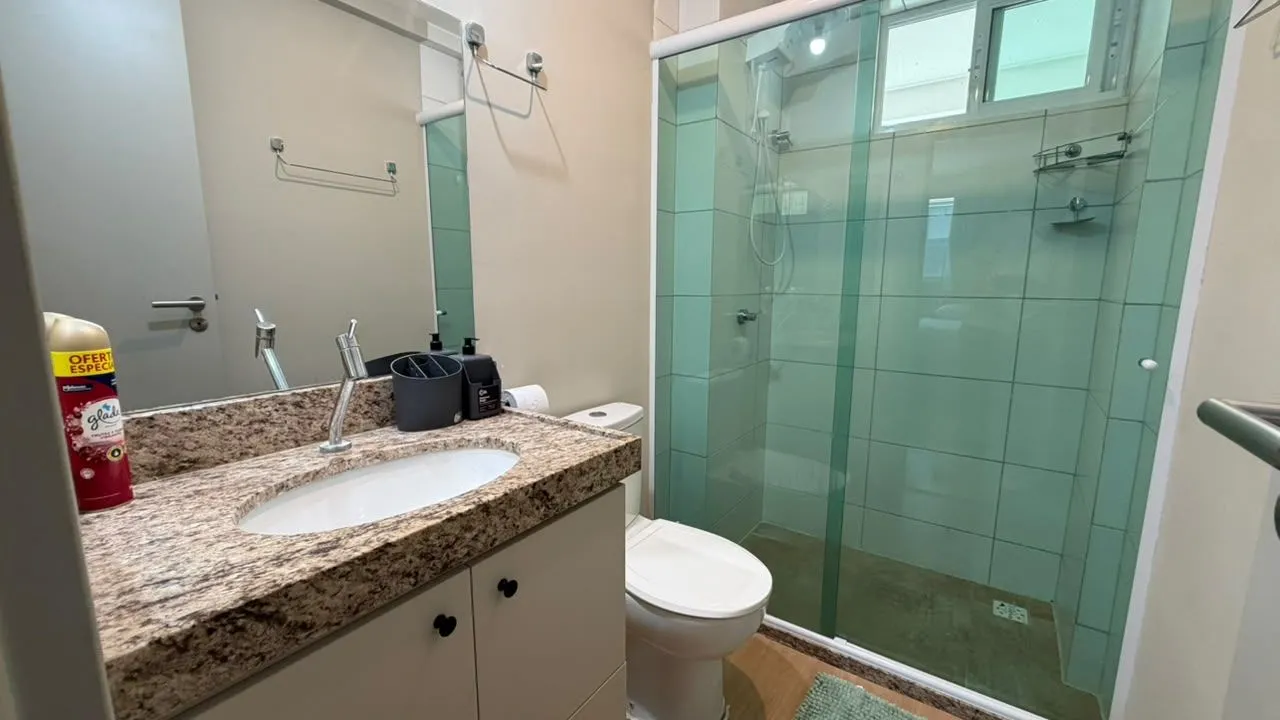 2-bedroom apartment in a building with a pool — photo 9