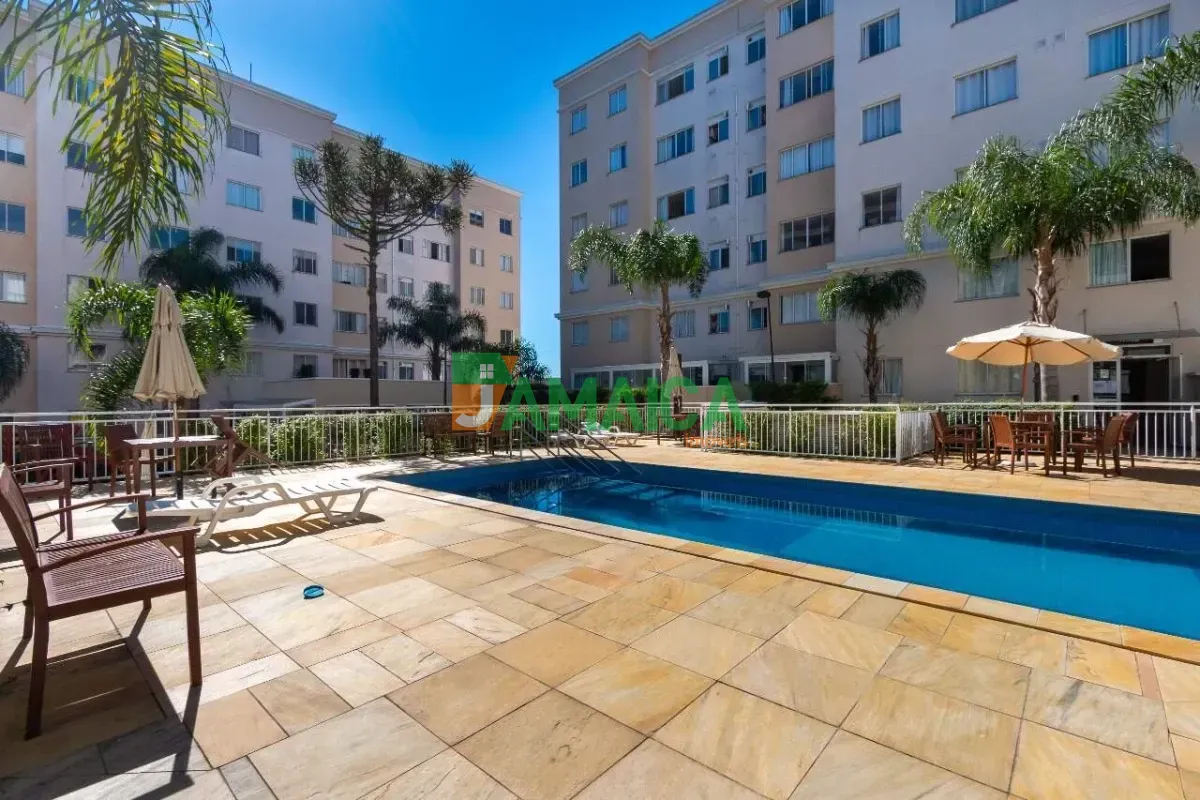 2-bedroom apartment in a building with a pool — photo 10