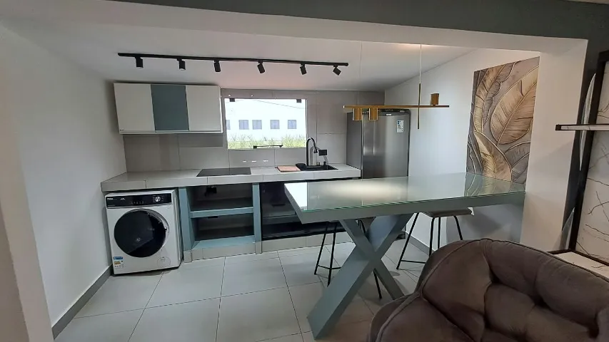 One-bedroom apartment with a washing machine in Curitiba