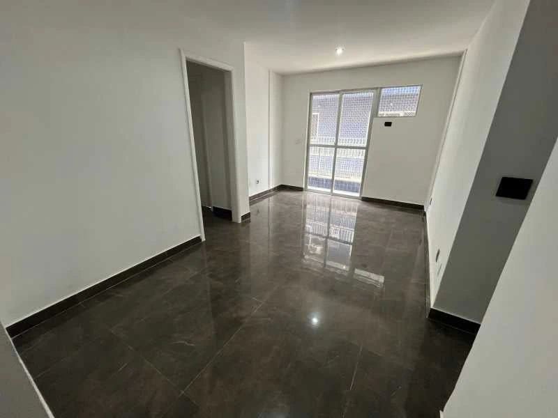 3-bedroom apartment in a building with a pool