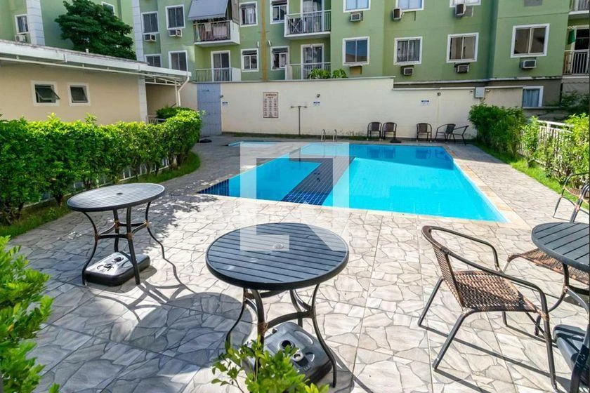2-bedroom apartment in a building with a pool — photo 34