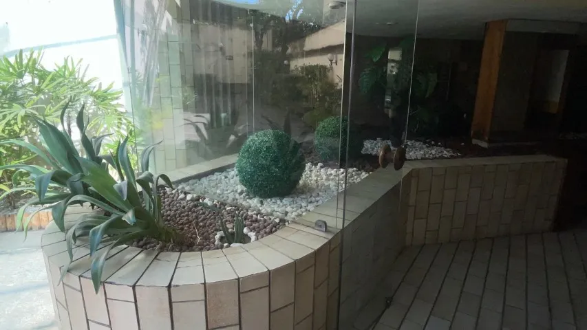 2-bedroom apartment in a building with a pool — photo 15