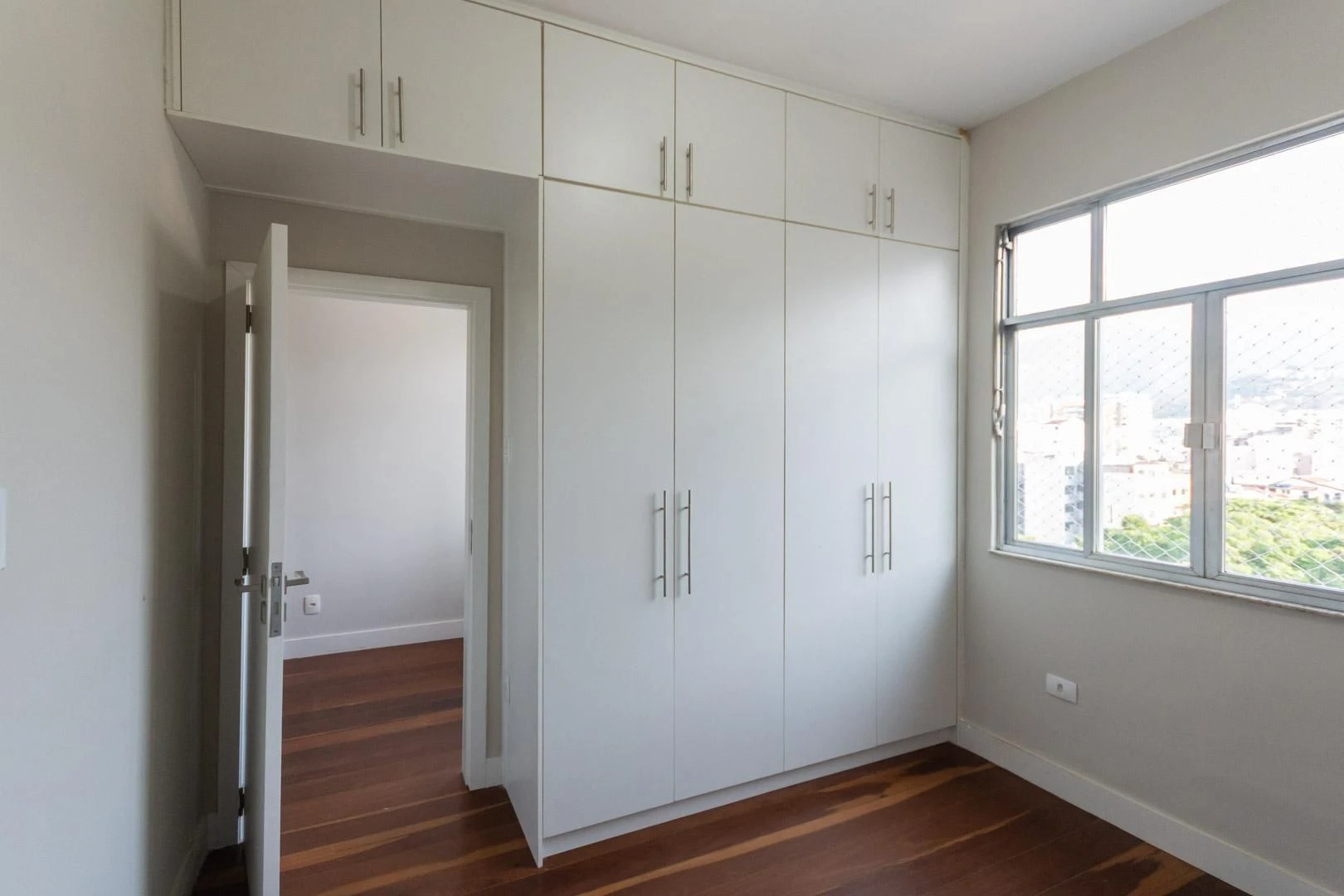 Wood or laminate floors in a 2-bedroom apartment, 64 m² — photo 11