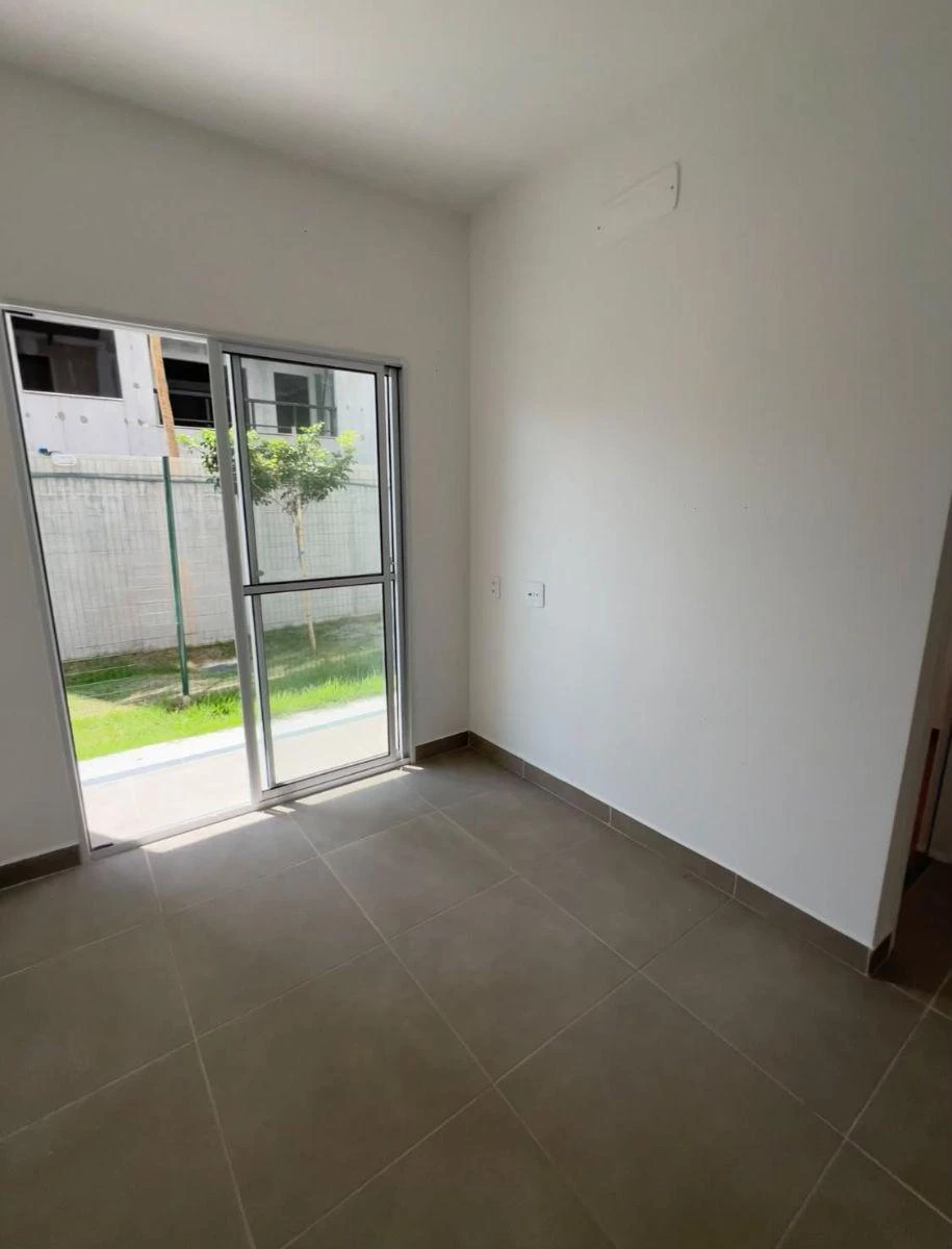 2-bedroom apartment in a building with a pool