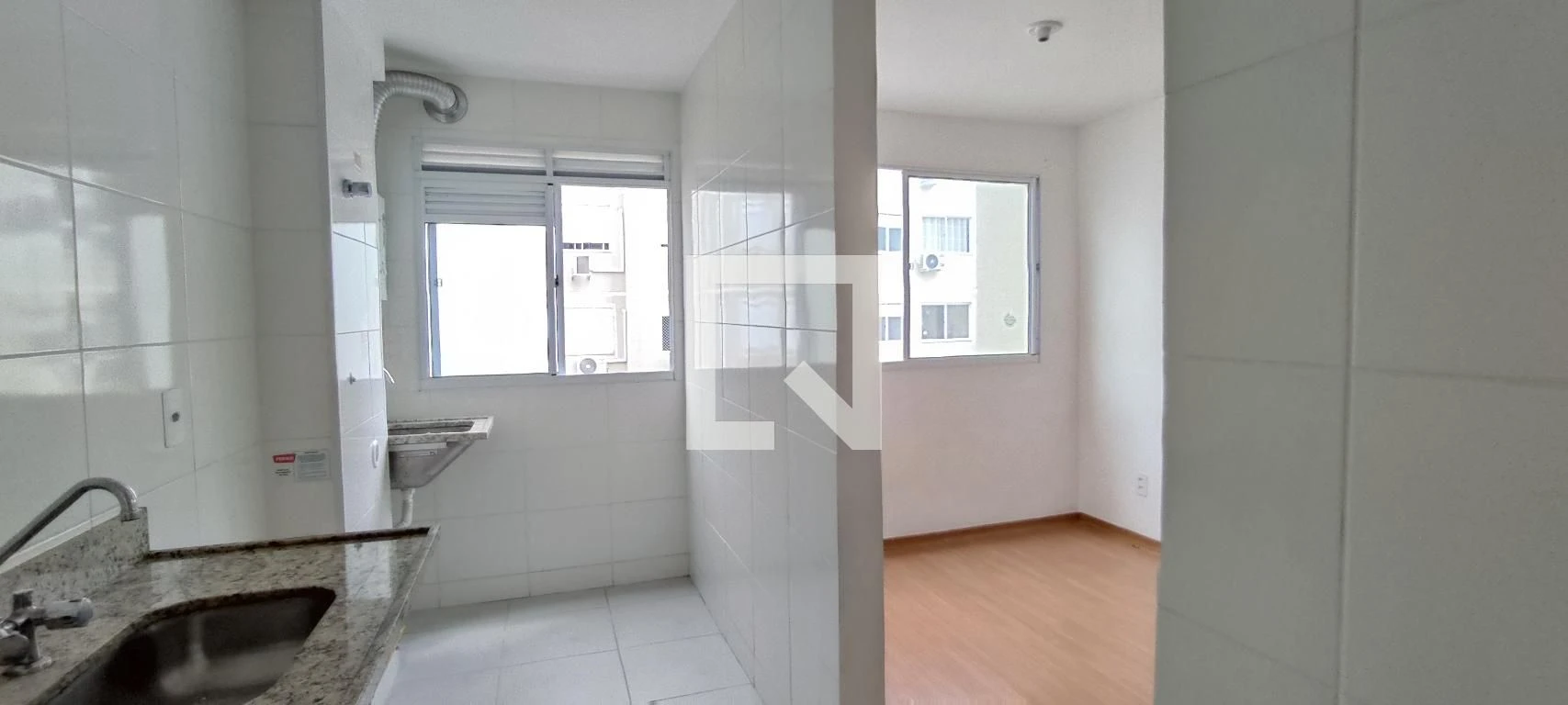2-bedroom apartment in a building with a pool — photo 18