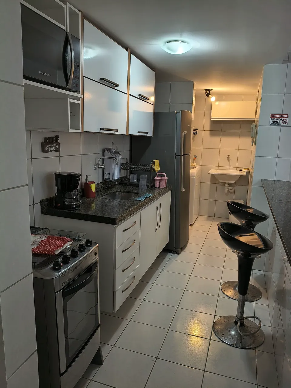 One-bedroom apartment in a building with a pool — photo 2