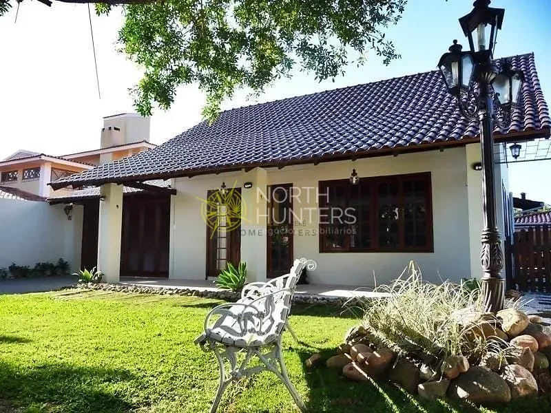 Casa com 4 dormitórios, 2 suítes e churrasqueira na varanda — photo 5