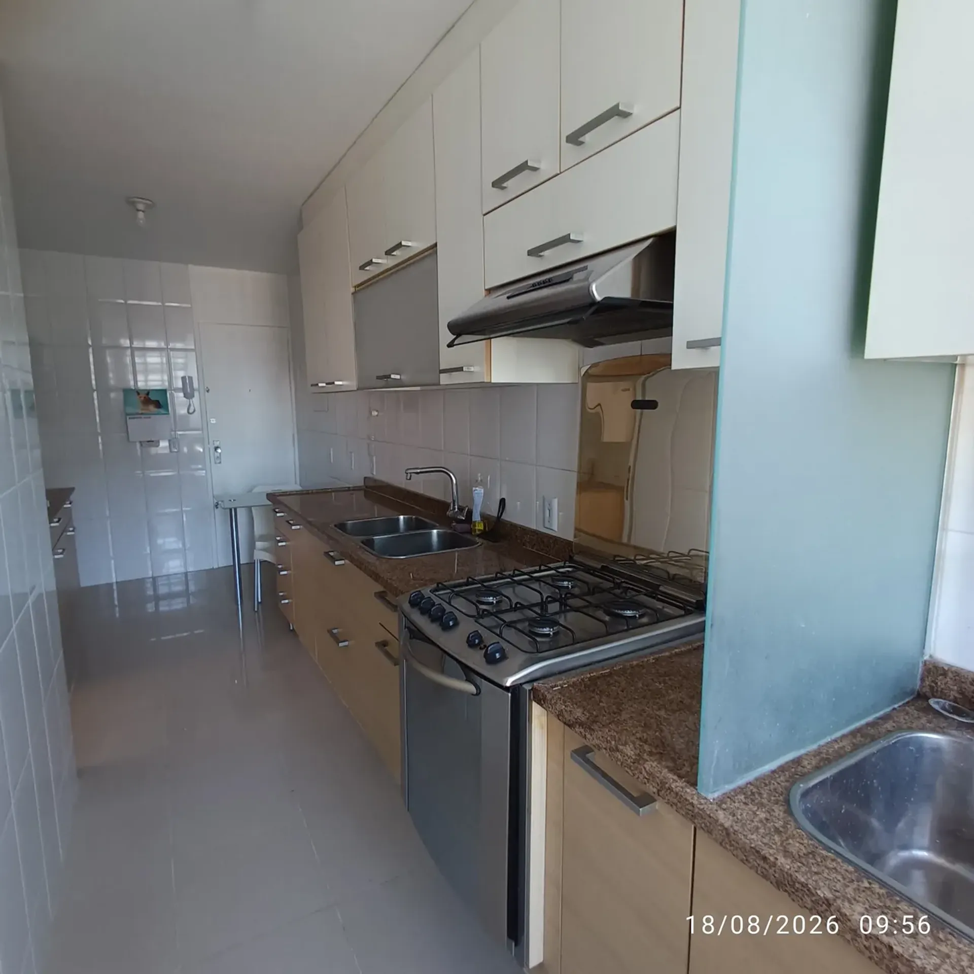 2-bedroom apartment in a building with a pool — photo 2
