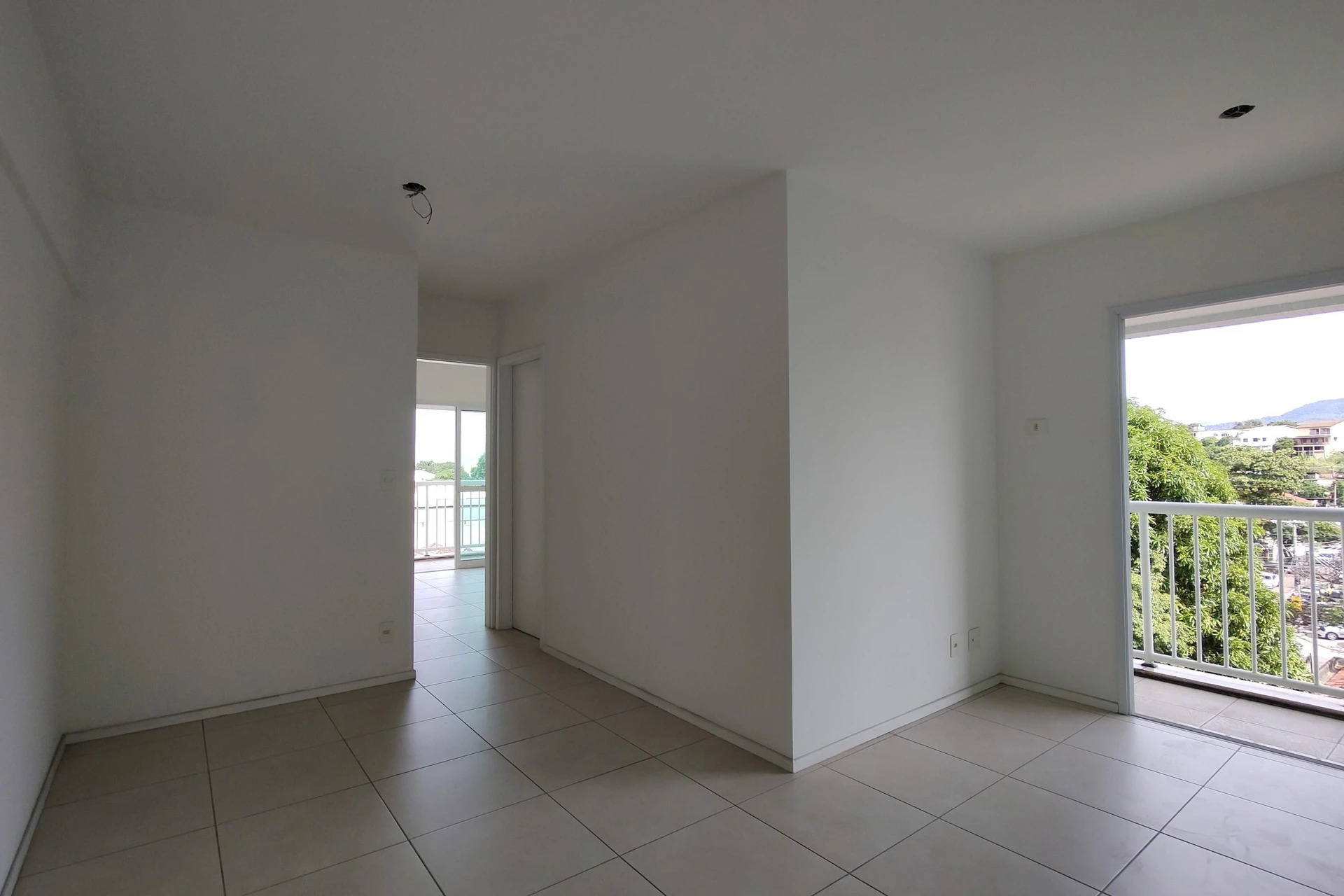 Unfurnished apartment with an open-plan kitchen and balcony — photo 11