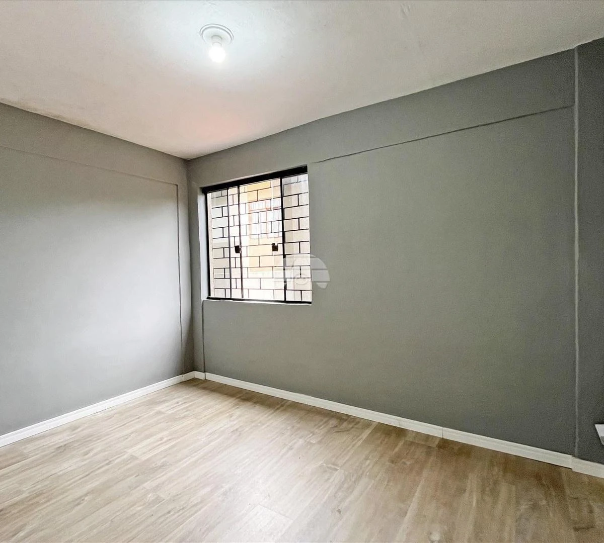 Wood or laminate floors in a 3-bedroom apartment, 48 m² — photo 9