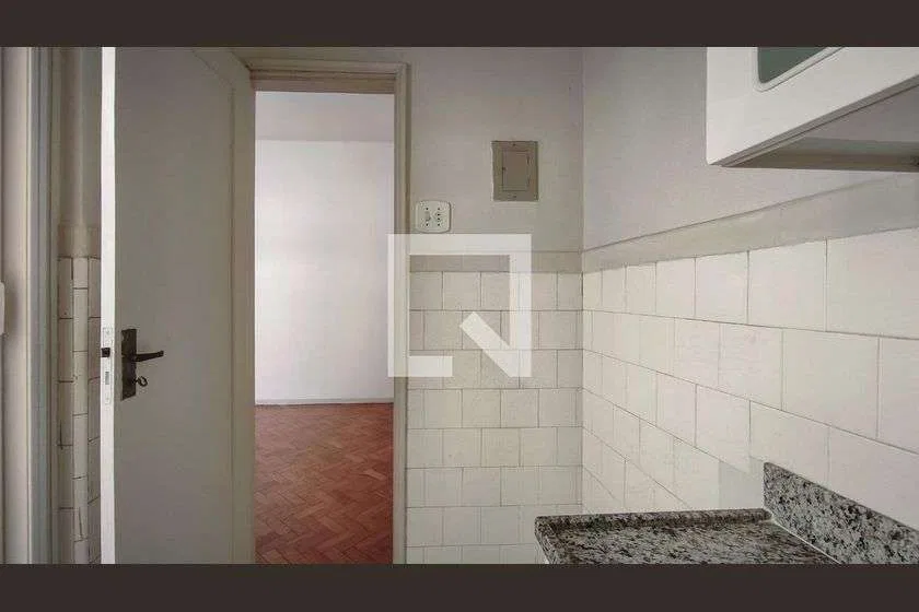 One-bedroom apartment with wood or laminate floors — photo 22