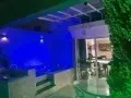 Balcony with a grill in a 2-bedroom apartment, 138 m² — photo 4