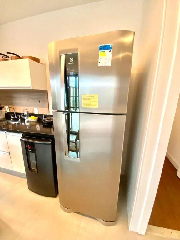 Furnished penthouse with balcony and open-plan kitchen — photo 30