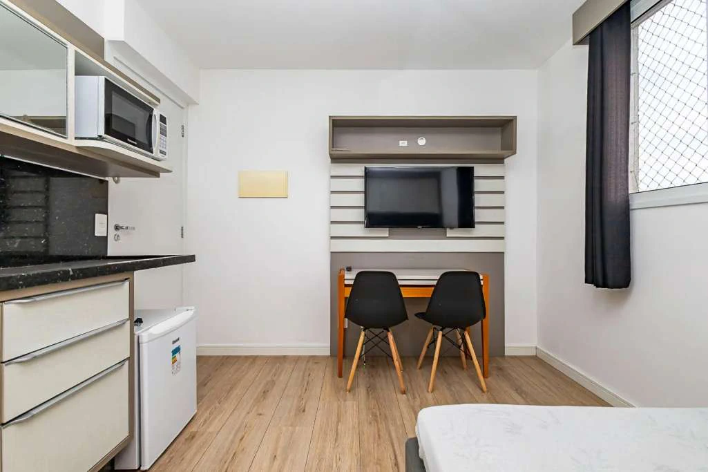 Студия 18 м² с 1 спальней и компактной кухней — photo 4