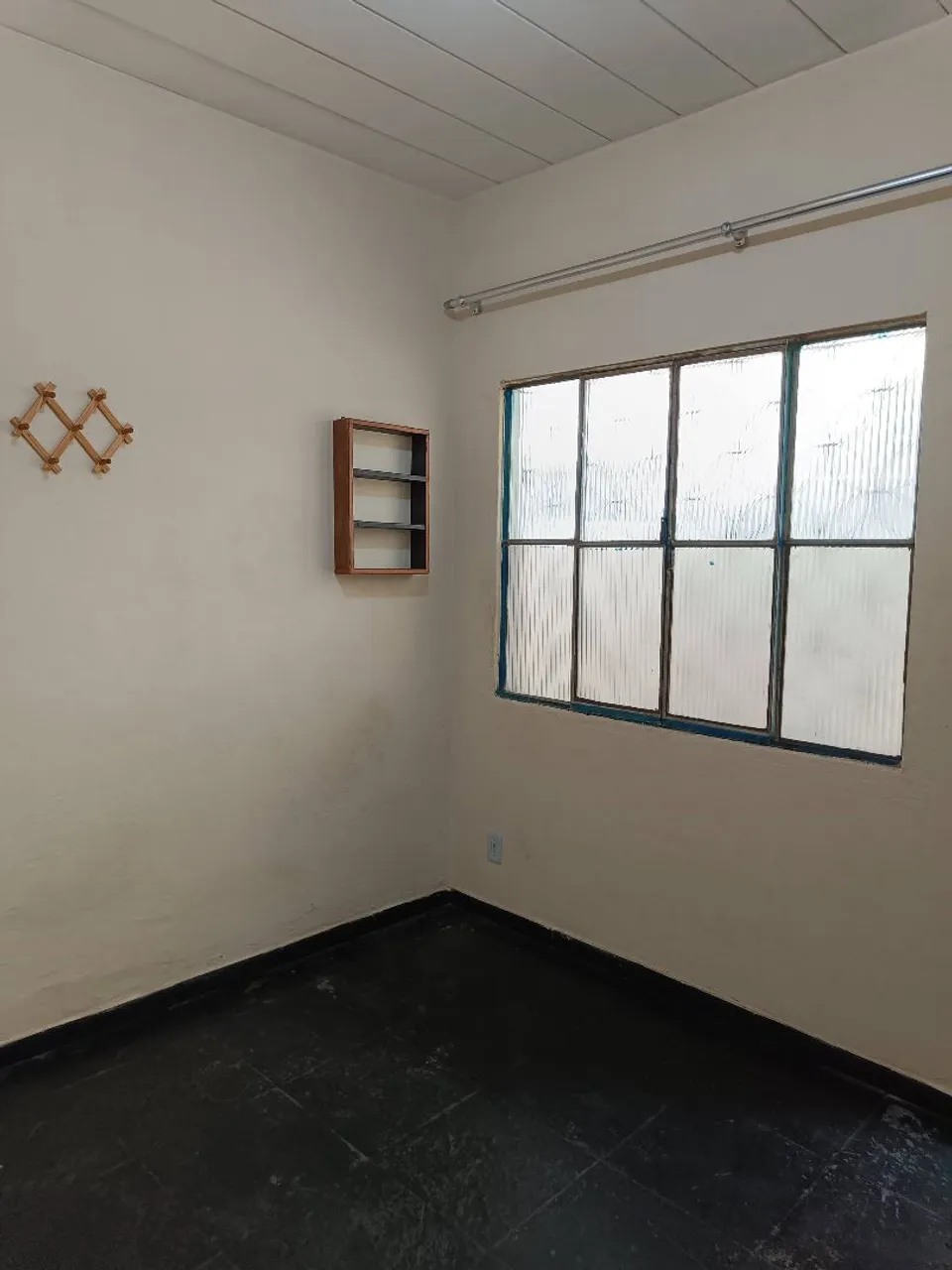 Unfurnished studio with a gas stove and laundry area — photo 13