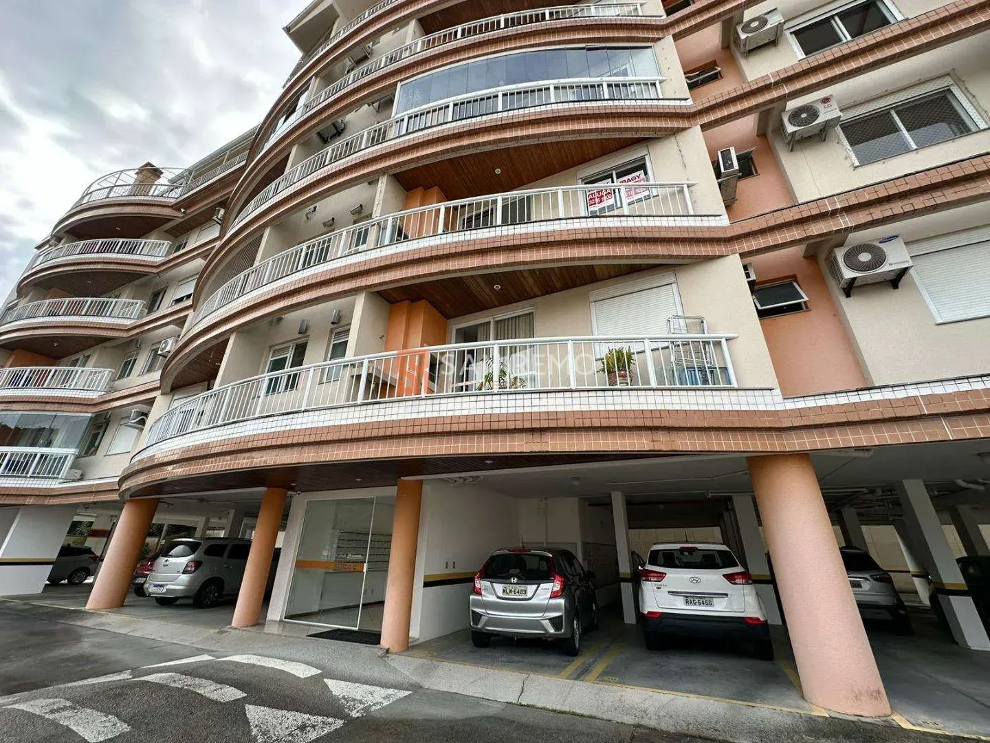 2-bedroom apartment in a building with a pool — photo 16