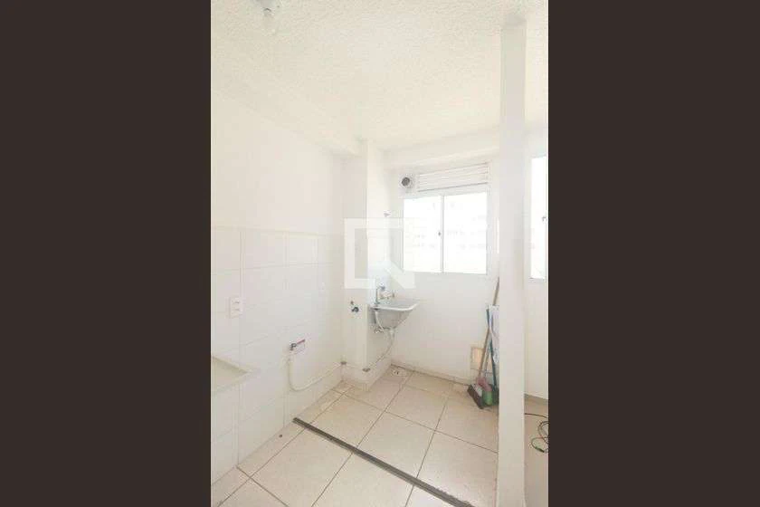 Minimal-style 2-bedroom apartment with ceramic floors — photo 12