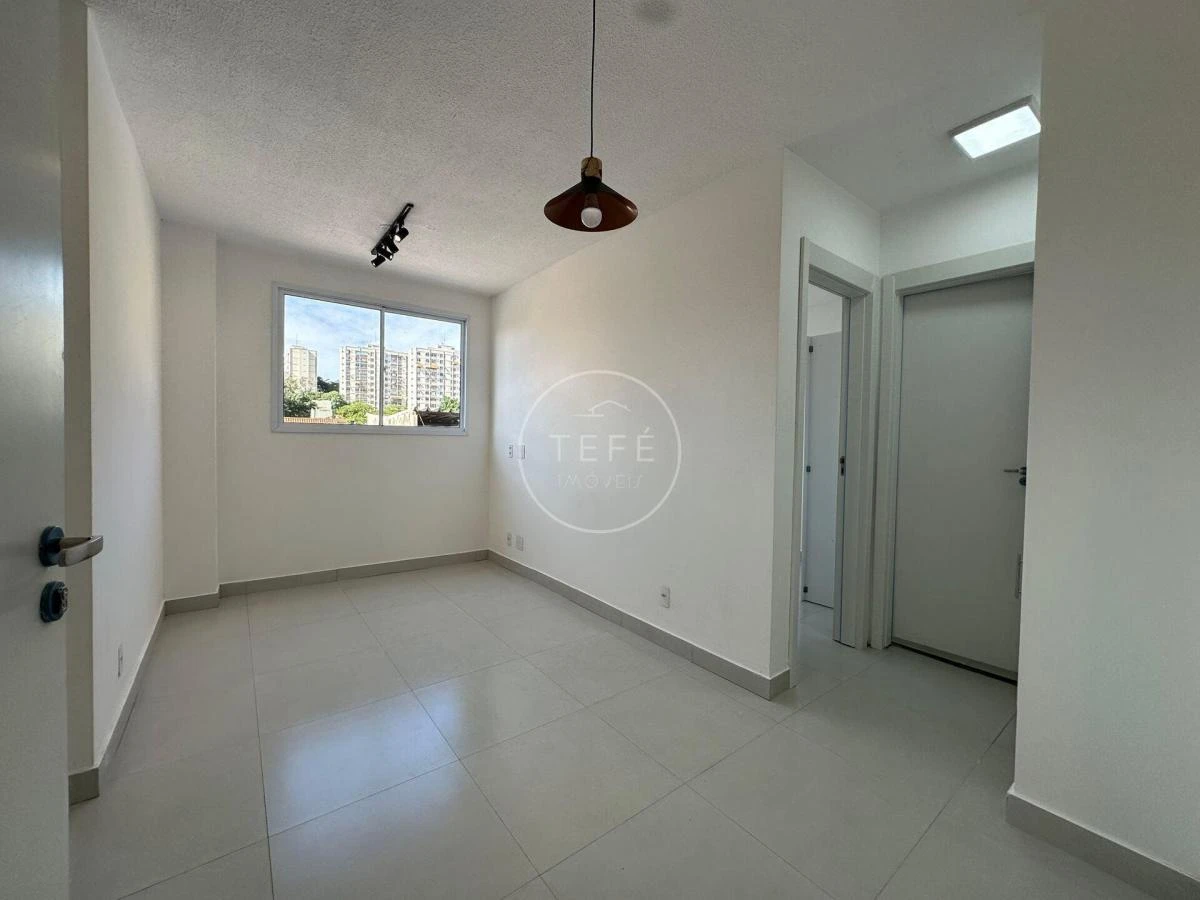 One-bedroom apartment in a building with a pool — photo 7
