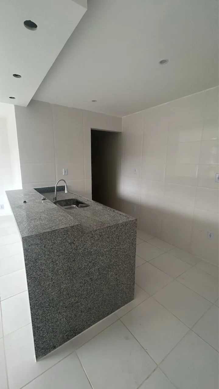 2-bedroom apartment with open-plan kitchen and electric stove — photo 2