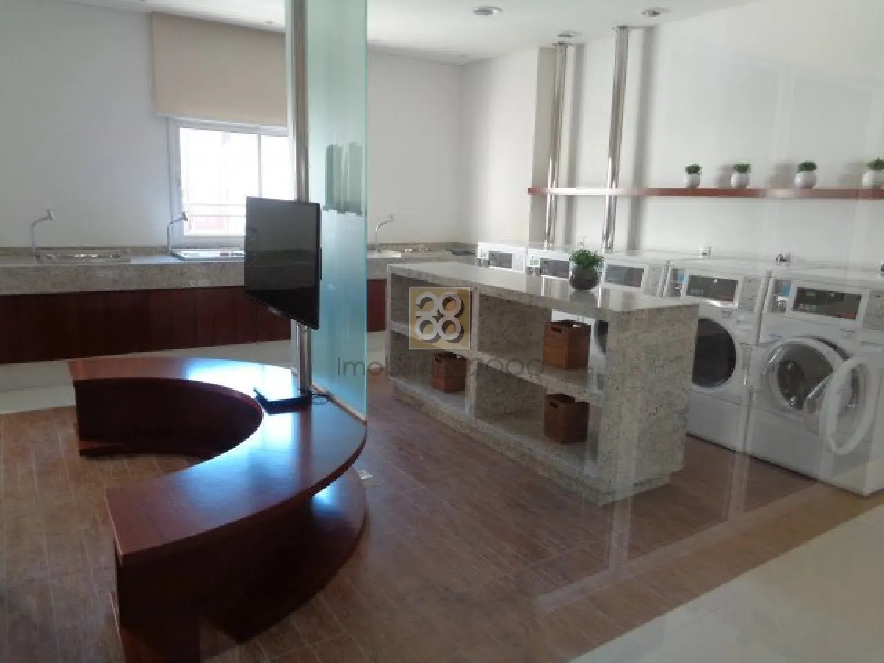 One-bedroom apartment with a washing machine in Curitiba