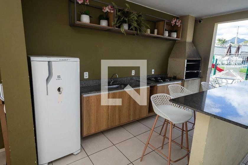 2-bedroom apartment in a building with a pool — photo 14
