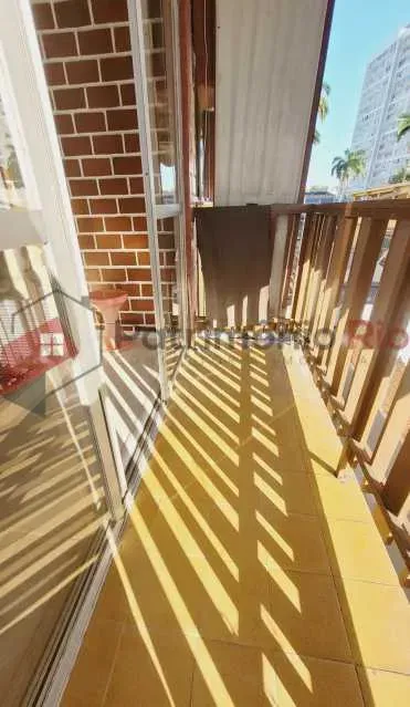 2-bedroom apartment in a building with a pool — photo 16