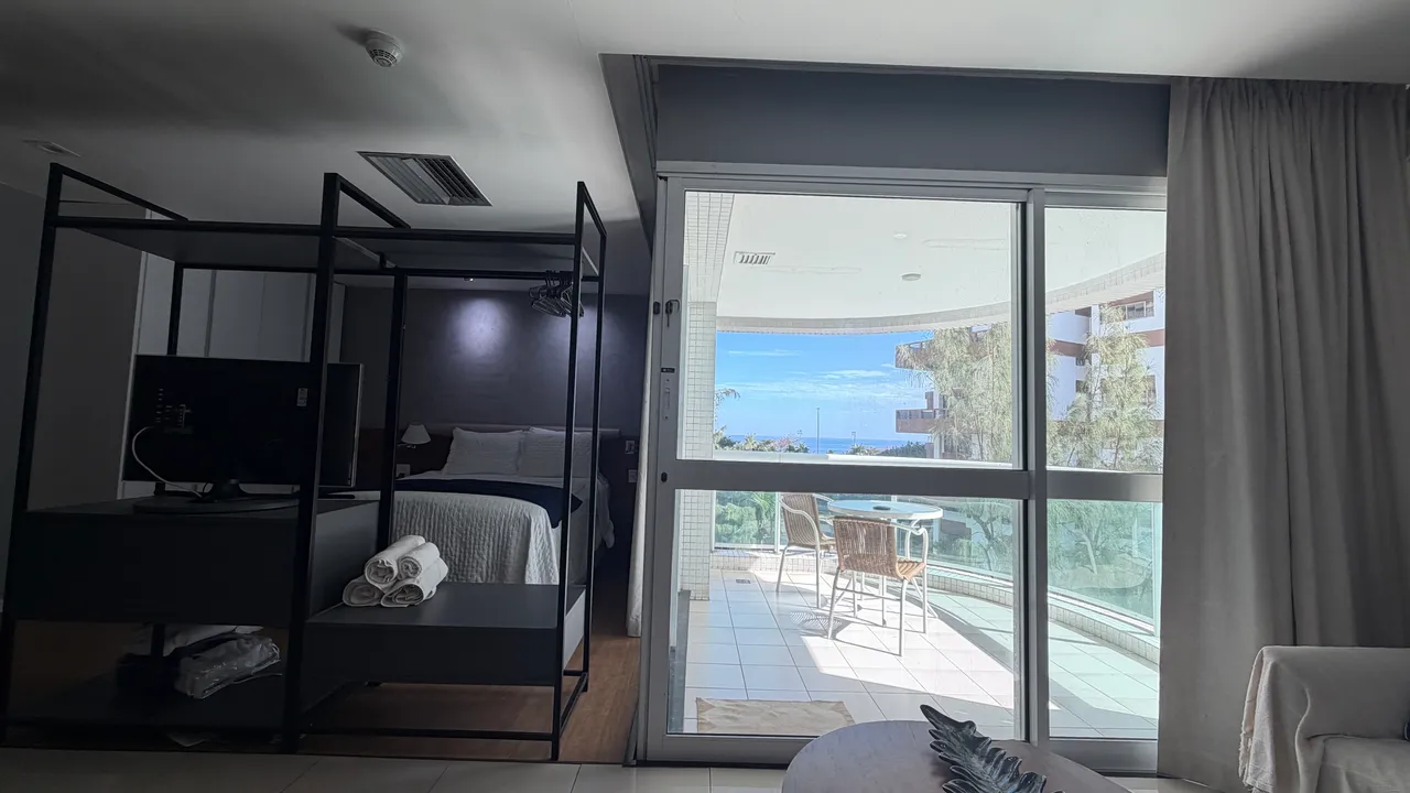 Furnished 1-bedroom apartment with balcony and compact kitchenette