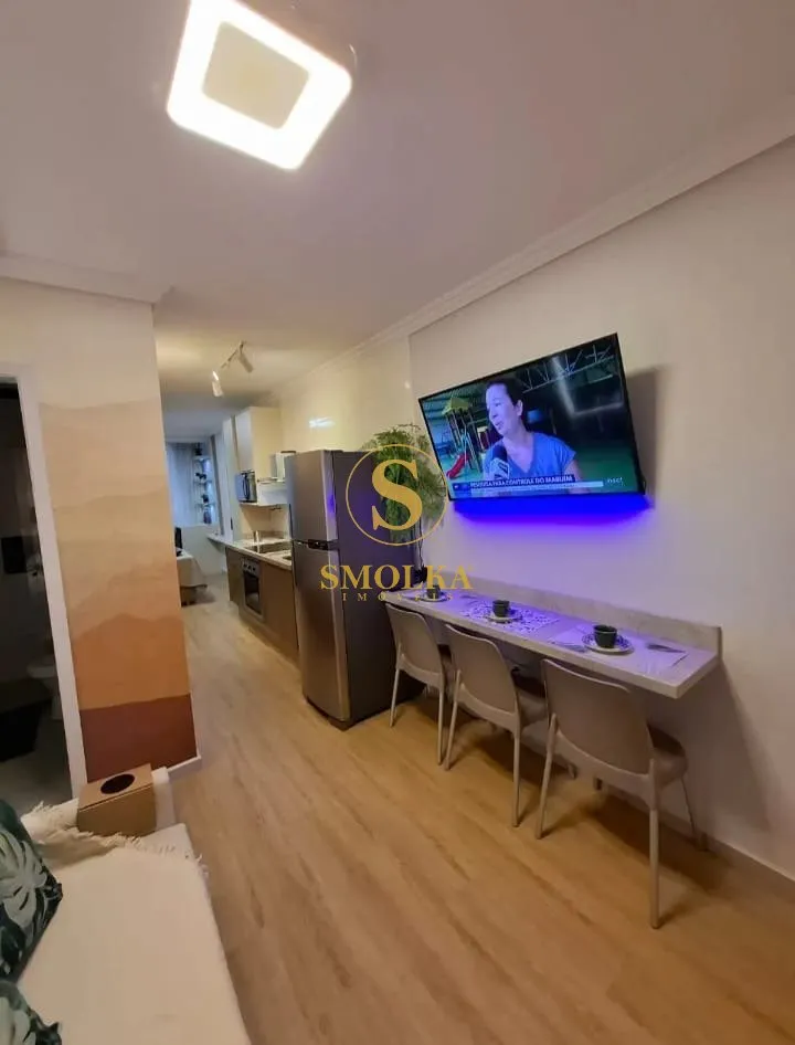 Furnished studio with integrated kitchen and glass shower — photo 14