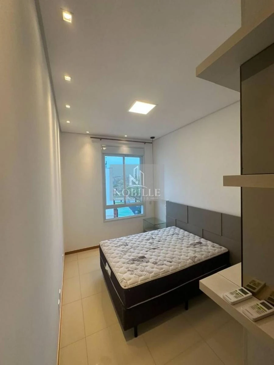 2-bedroom apartment in a building with a pool — photo 14