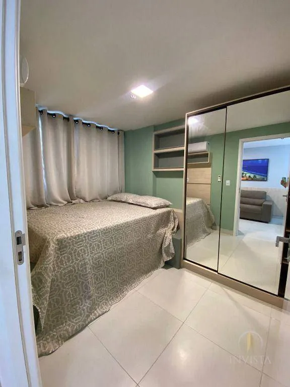 2-bedroom apartment in a building with a pool — photo 2
