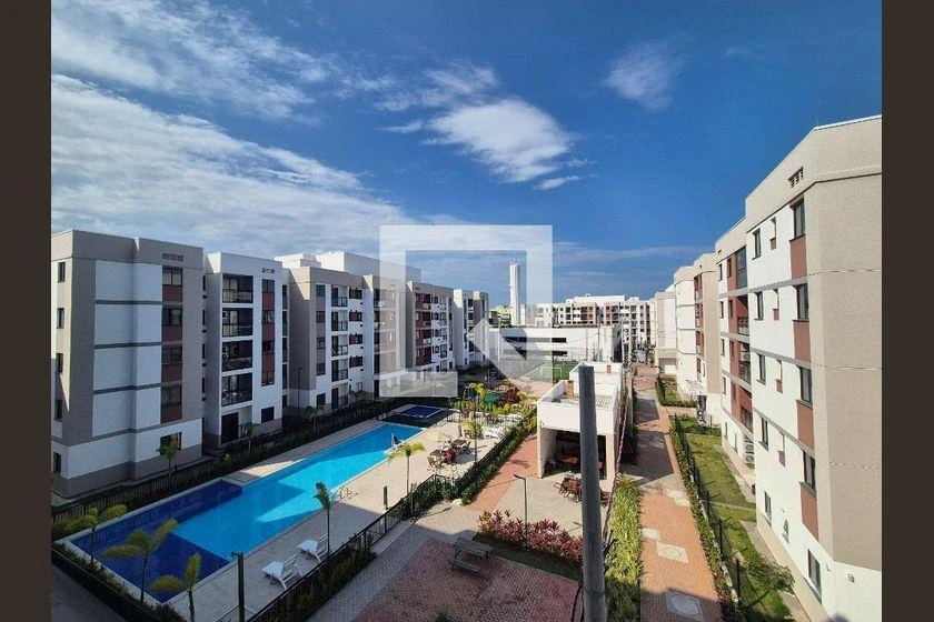 2-bedroom apartment in a building with a pool — photo 3