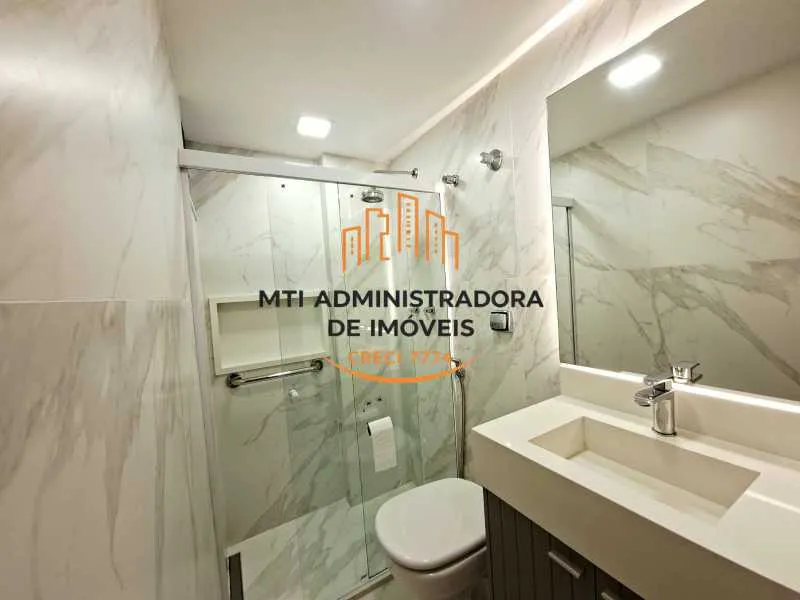 2-bedroom apartment in a building with a pool — photo 17