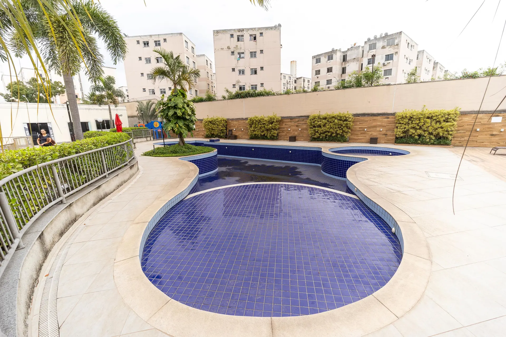2-bedroom apartment in a building with a pool — photo 3