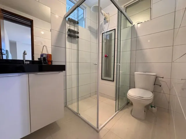 2-bedroom apartment in a building with a pool — photo 13