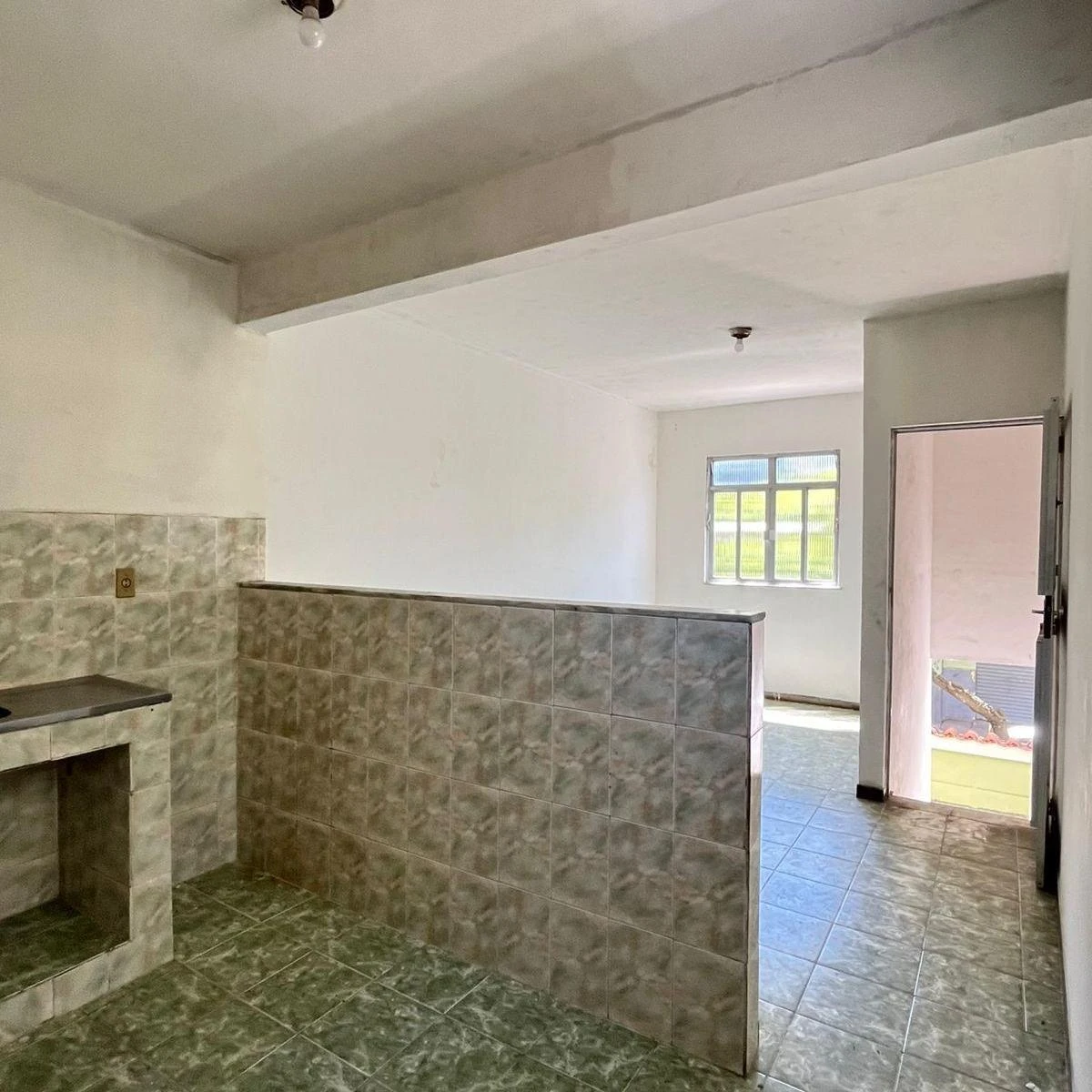 Unfurnished studio with no parking, gas heater and electric shower
