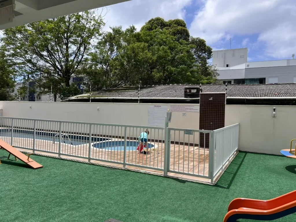 One-bedroom apartment in a building with a pool — photo 9