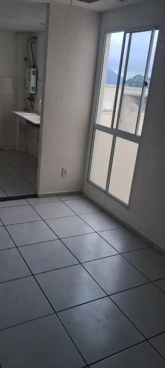 2-bedroom apartment in a building with a pool