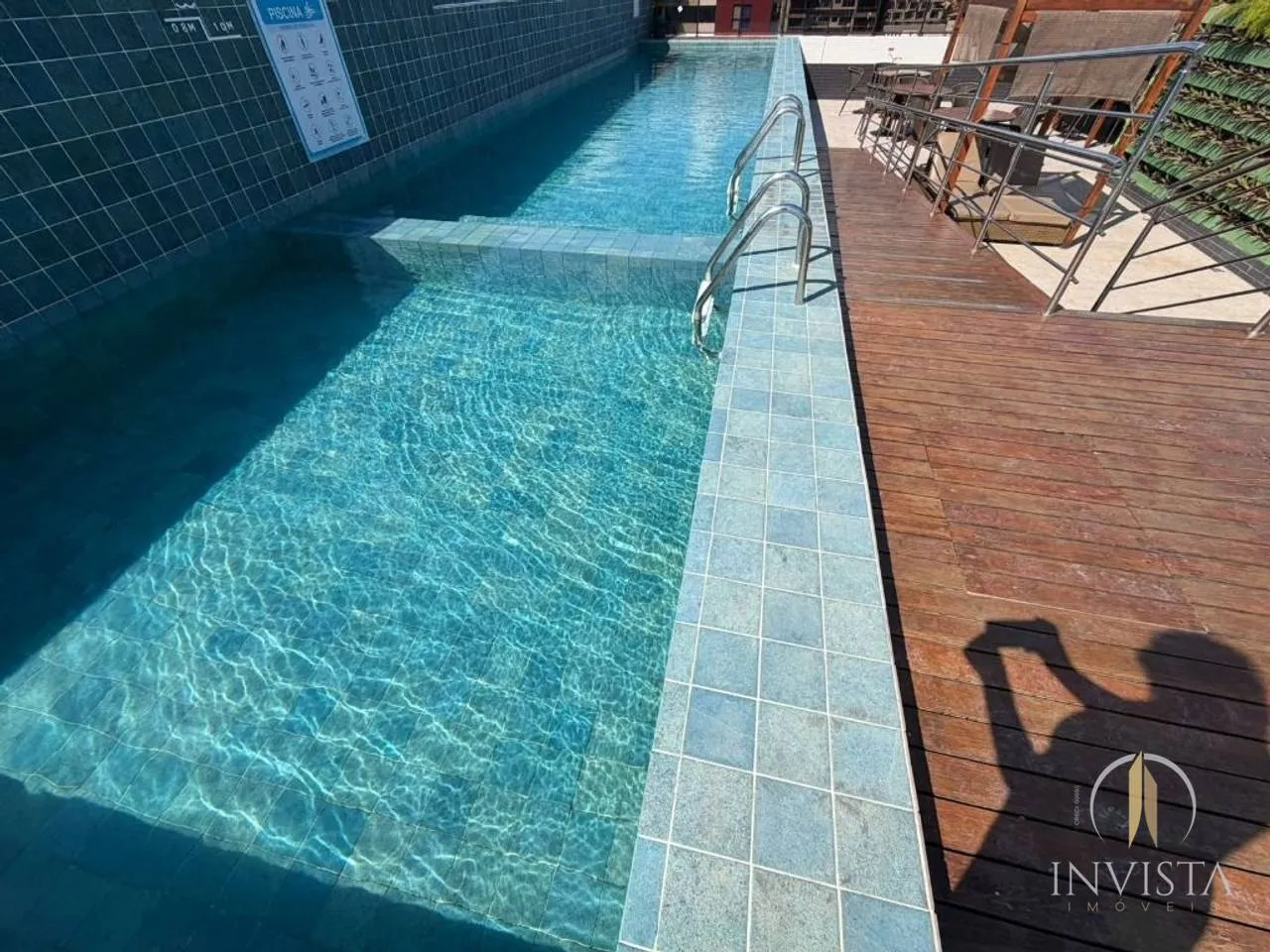 2-bedroom apartment in a building with a pool — photo 6