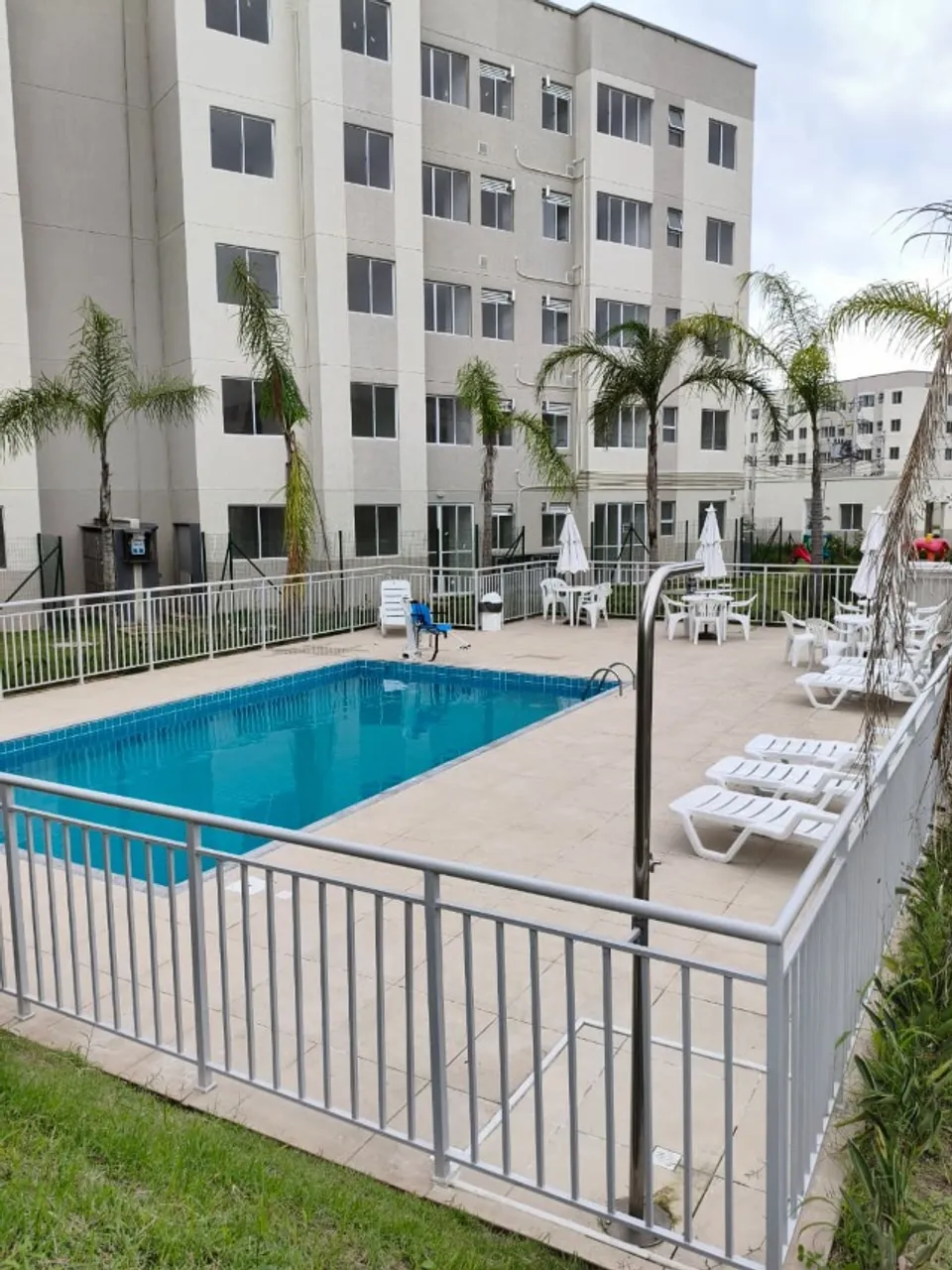 2-bedroom apartment in a building with a pool — photo 9