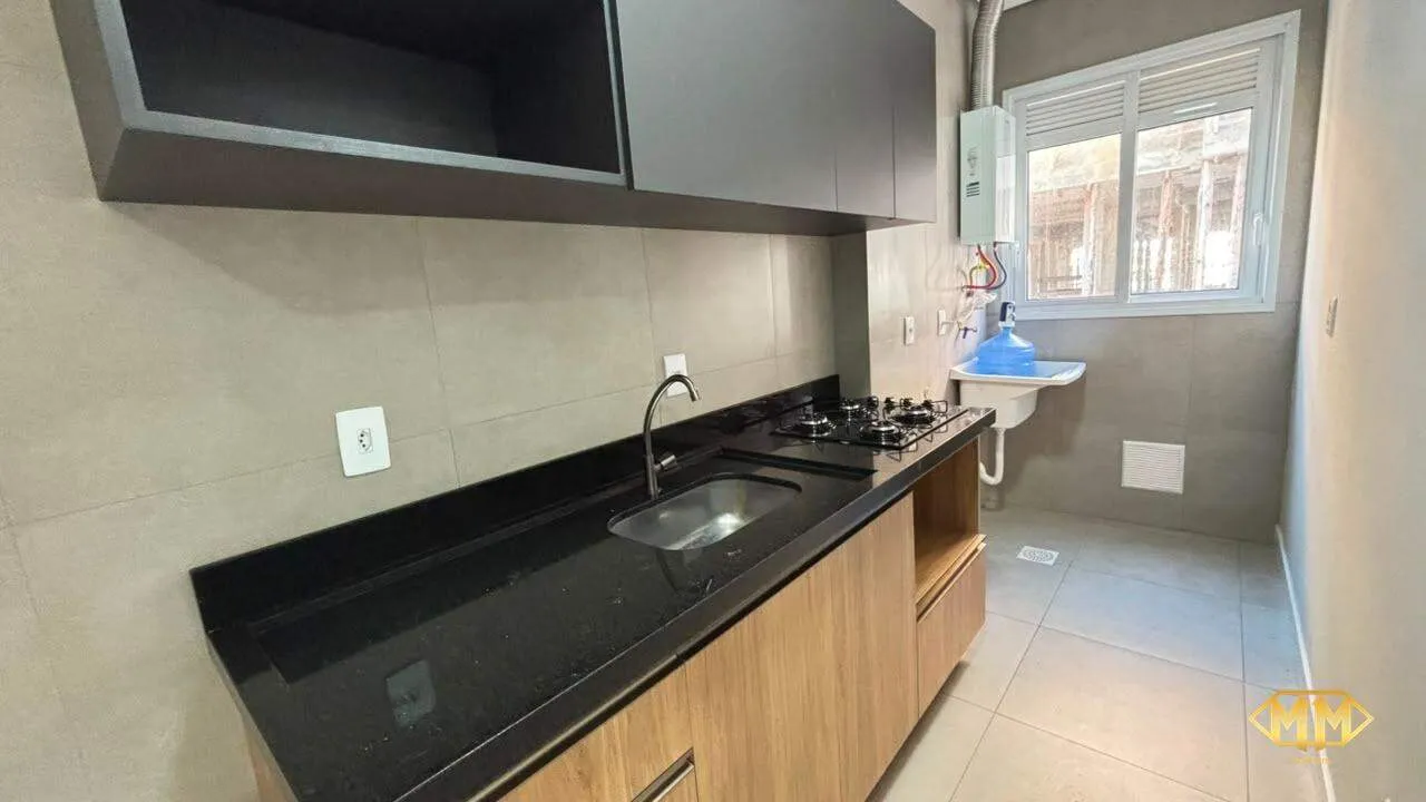Apartamento de 2 dormitórios no 2º andar com cozinha aberta a gás — photo 10