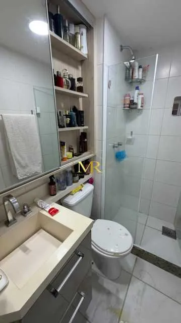 2-bedroom apartment in a building with a pool — photo 12