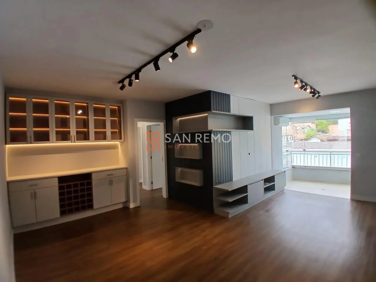 3-bedroom apartment in a building with a pool