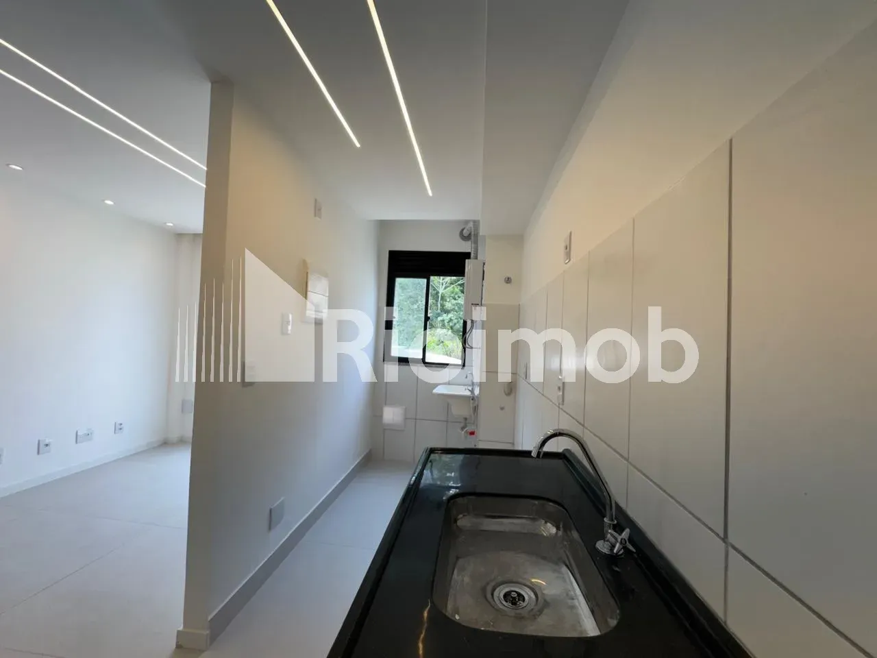 2-bedroom apartment with an open-plan kitchen — photo 9