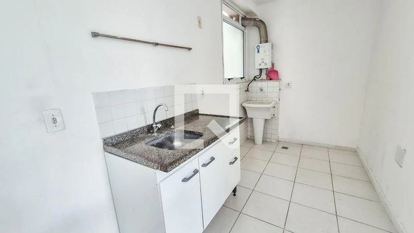 2-bedroom apartment in a building with a pool — photo 2